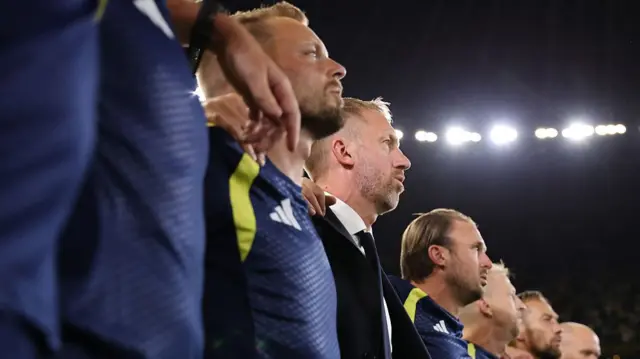 Graham Potter lines up with his backroom staff ahead of Tunisia match