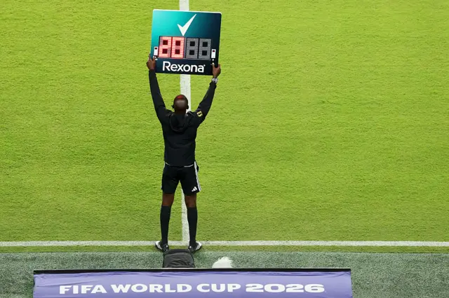 The fourth official holds up the Rexona substitution board during the FIFA World Cup 2026 Group D match between Türkiye and Paraguay at San Francisco Bay Area Stadium