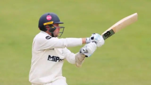 Glamorgan's Mason Crane playing an attacking shot.