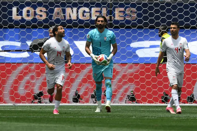 Alireza Beiranvand holds the ball next