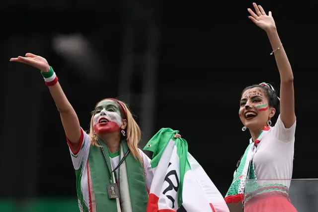 Two Iran fans inside Los Angeles Stadium