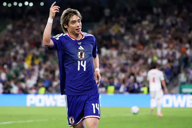 Junya Ito #14 of Japan celebrates scoring his team's third goal during the FIFA World Cup 2026 Group F match between Tunisia and Japan at Monterrey Stadium