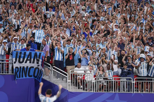 Messi celebrates in front of Argentina fans