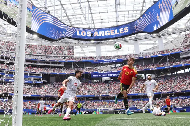Leandro Trossard #10 of Belgium attempts the header