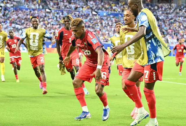 Helio Varela (C) celebrates with teammates after scoring his team's second goal during the 2026 World Cup Group H football match between Uruguay and Cape Verde