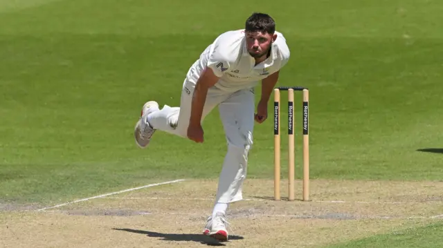 Tom Norton bowls for Glamorgan