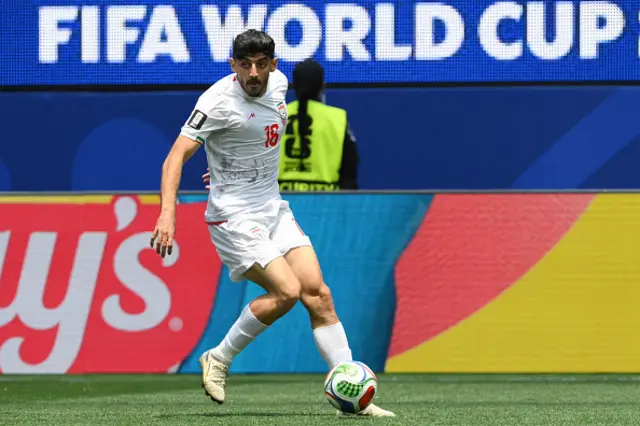Mehdi Torabi controls the ball