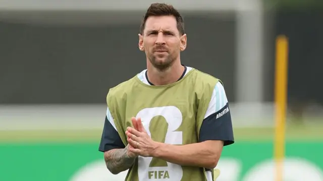 Lionel Messi in training with hands together as if in prayer