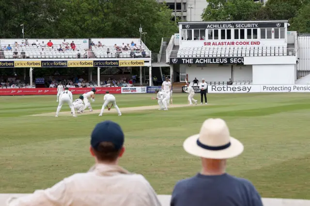 Crowd watching cricket