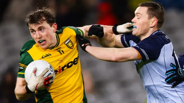 Shane O'Donnell is challenged by Con O'Callaghan during Donegal's league win over Dublin