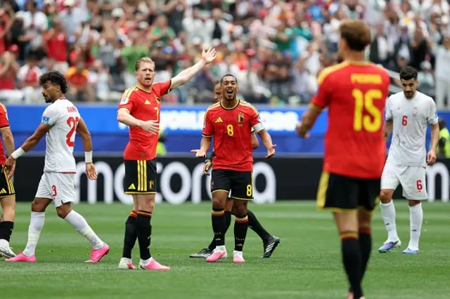 Belgium's Kevin De Bruyne and Belgium's Youri Tielemans react