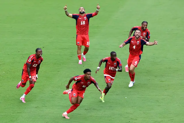 Kevin Pina #6 of Cabo Verde celebrates with teammates after scoring the team's first goal during the FIFA World Cup 2026 Group H match between Uruguay and Cabo Verde
