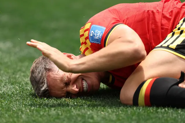 Leandro Trossard #10 of Belgium lies on the pitch