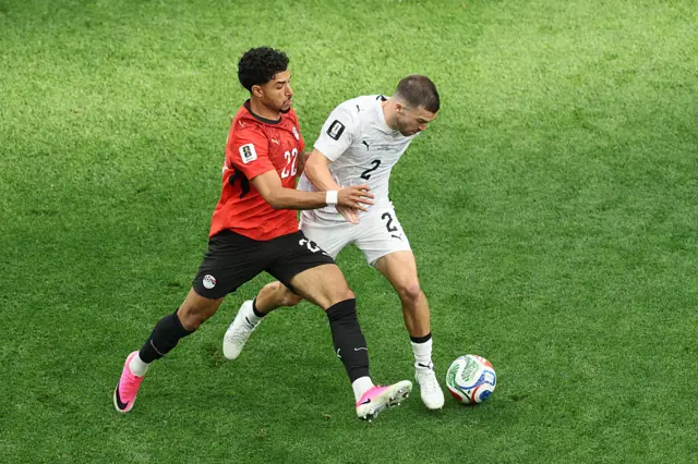 Tim Payne #2 of New Zealand is challenged by Omar Marmoush #22 of Egypt during the FIFA World Cup 2026 Group G match between New Zealand and Egypt