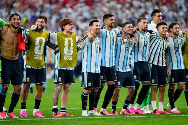 Nico Gonzalez, Nicolas Tagliafico, Juan Musso, Thiago Almada, Nicolas Otamendi, Rodrigo De Paul, Cristian Romero, Lionel Messi, Valentin Barco and Gonzalo Montiel of Argentina celebrate