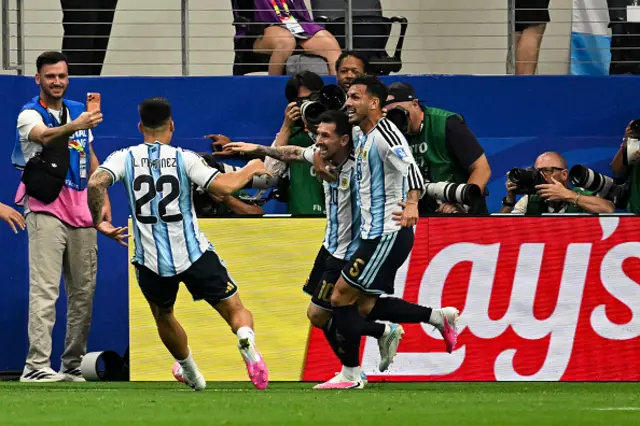 Lionel Messi of Argentina scores