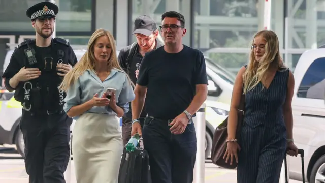 Burnham arriving at Manchester Piccadilly earlier