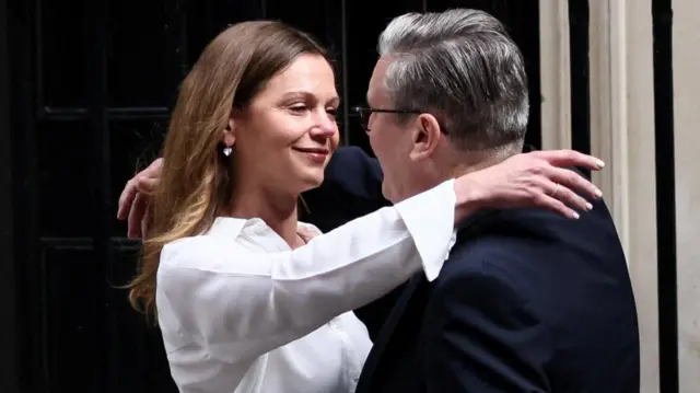 British Prime Minister Keir Starmer hugs his wife Victoria Starmer after announcing the timeline for his resignation