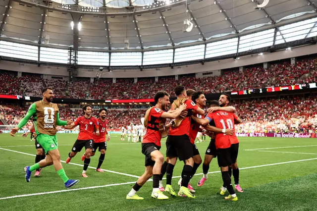 Mohamed Salah #10 of Egypt celebrates with teammates after scoring the team's second goal during the FIFA World Cup 2026 Group G match between New Zealand and Egypt