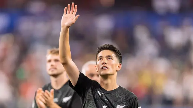 Elijah Just puts his hand in the air after New Zealand's game against Iran