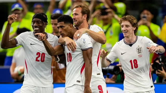 Jude Bellingham of England celebrates with Noni Madueke of England, Harry Kane of England and Anthony Gordon of England after scoring his team's third goal during the FIFA World Cup 2026 Group L match between England and Croatia at Dallas Stadium on June 17, 2026 in Dallas, Texas.