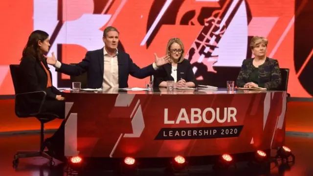 Lisa Nandy, Keir Starmer, Rebecca Long-Bailey and Emily Thornberry are pictured sitting behind a red studio desk with the words 'Labour leadership 2020' on the front