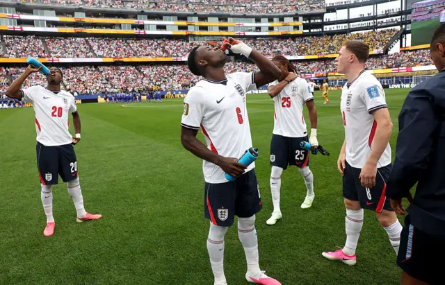 Marc Guehi #6 of England takes a drink