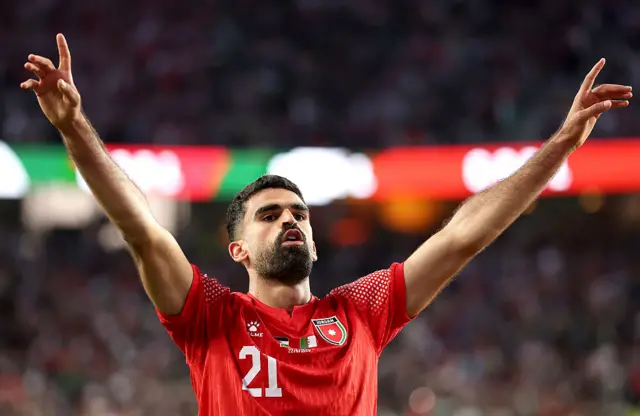 Nizar Alrashdan #21 of Jordan celebrates scoring his team's first goal during the FIFA World Cup 2026 Group J match between Jordan and Algeria
