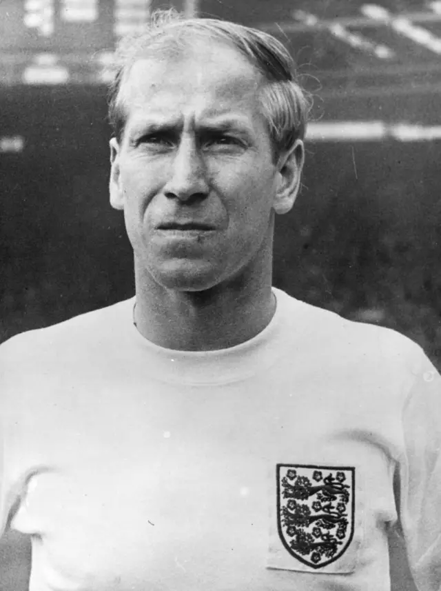Bobby Charlton in an England football shirt.