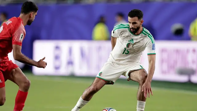 Nizar Al Rashdan of Jordan, Rayan Ait Nouri of Algeria during the World Cup match between Jordan v Algeria at the San Francisco Bay Area Stadium