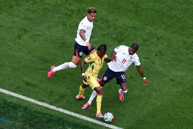 Fatawu Issahaku #7 of Ghana is fouled by Marcus Rashford #11 of England