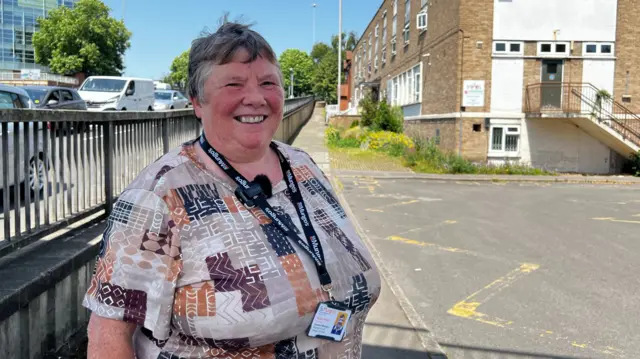 Wendy Dodds in a car park in the sun