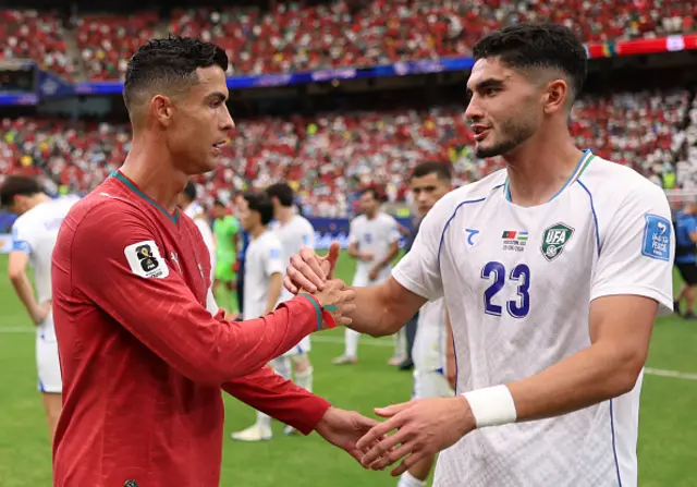 Cristiano Ronaldo #7 of Portugal shakes hands