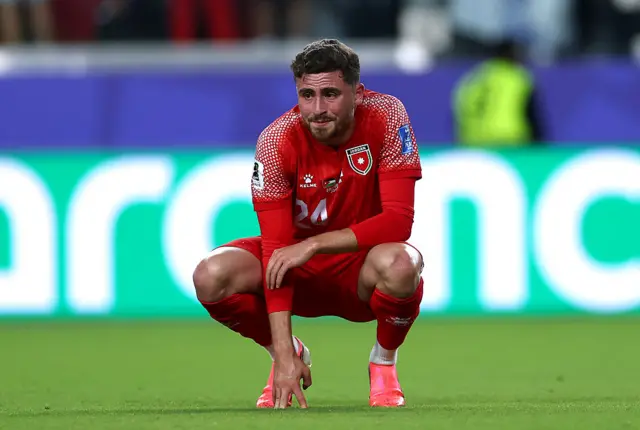 Jordan players look defeated as they exit the World Cup