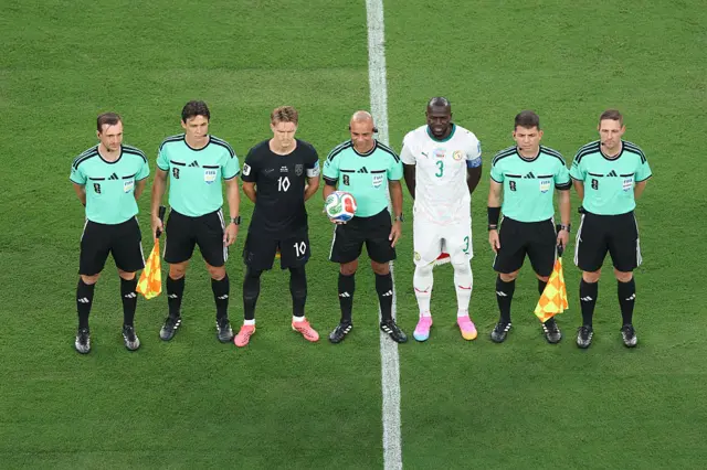 Martin Odegaard #10 of Norway and Kalidou Koulibaly #3 of Senegal pose for photos with match officials before the FIFA World Cup 2026 Group I match between Norway and Senegal