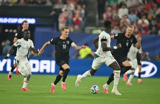 Martin Odegaard and forward #09 Erling Braut Haaland eyes on the ball during the 2026 World Cup Group I football match between Norway and Senegal