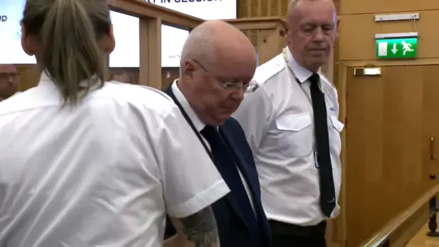 Screen grab taken from PA Video of former SNP chief executive Peter Murrell (centre) appearing at Edinburgh High Court where he was jailed for more than five years after he admitted embezzling more than £400,000 from his party over a 12-year period.