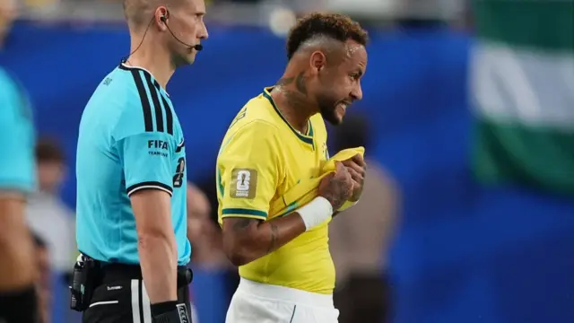 Neymar waiting to come on for Brazil