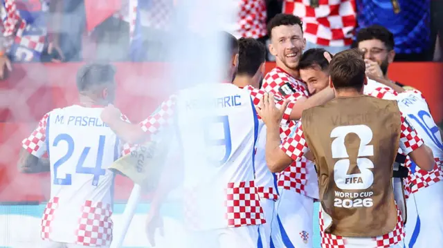 Croatia's Ante Budimir celebrates with teammates scoring his team's first goal during the 2026 World Cup Group L football match between Panama and Croatia.