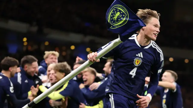 Scott McTominay celebrates during Scotland's win over Denmark last year