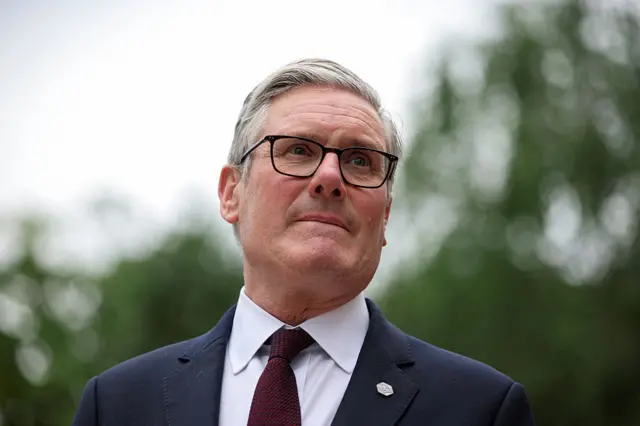 Prime Minister Keir Starmer looks on as he awaits Switzerland's Federal President Guy Parmelin on the sidelines of the G7 summit on June 16, 2026 in Evian-les-Bains, France.