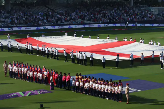 A picture of the teams lining up for the anthems