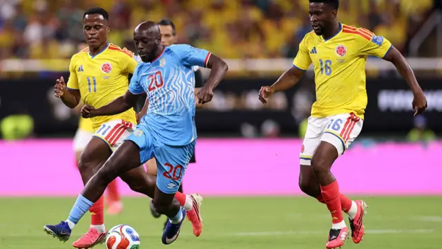 Yoane Wissa #20 of Congo DR controls the ball against Jhon Arias #11 and Jefferson Lerma #16 of Colombia during the FIFA World Cup 2026 Group K match between Colombia and Congo DR.
