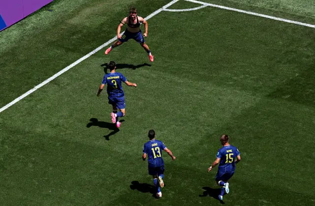 Ermin Mahmic #26 of Bosnia and Herzegovina celebrates