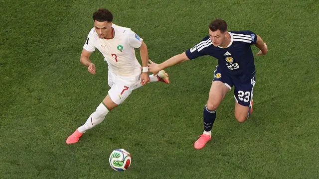 Chemsdine Talbi #7 of Morocco in action challenges for the ball with Kenny McLean #23 of Scotland during the FIFA World Cup 2026 Group C match between Scotland and Morocco at Boston Stadium on June 19, 2026 in Foxborough, Massachusetts.