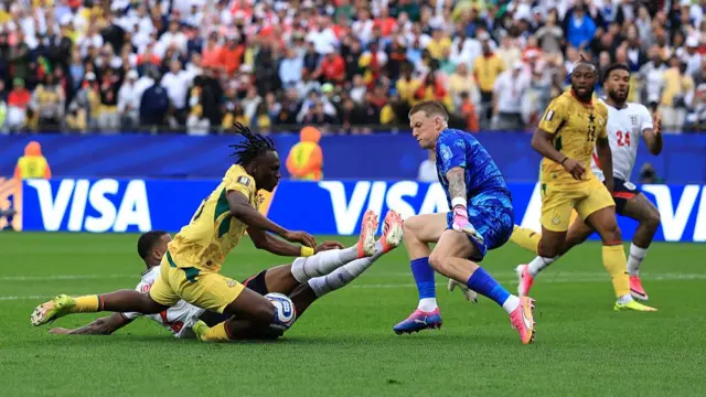 Prince Adu #25 of Ghana is challenged by Ezri Konsa #2 of England in the penalty box during the FIFA World Cup 2026 Group L match between England and Ghana at Boston Stadium on June 23, 2026 in Foxborough, Massachusetts