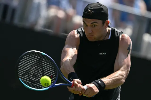 Britain's Jack Draper returns to US player Marcos Giron