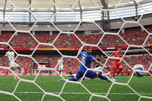Ruben Vargas of Switzerland scores