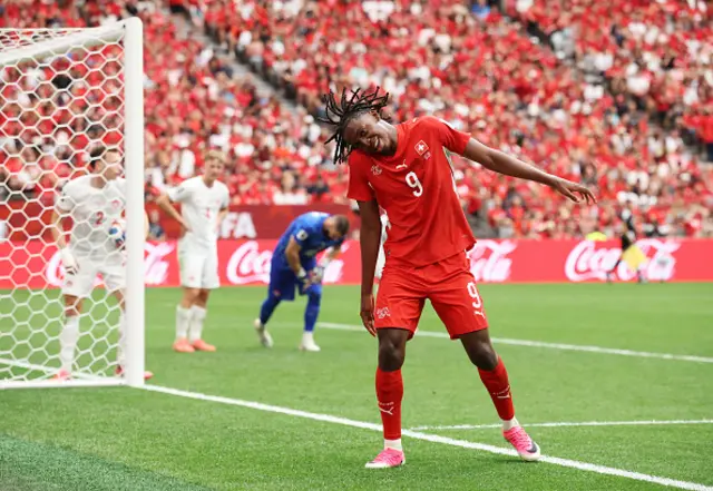 Johan Manzambi #9 of Switzerland celebrates