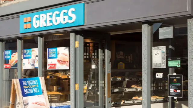 The shop front of a Greggs